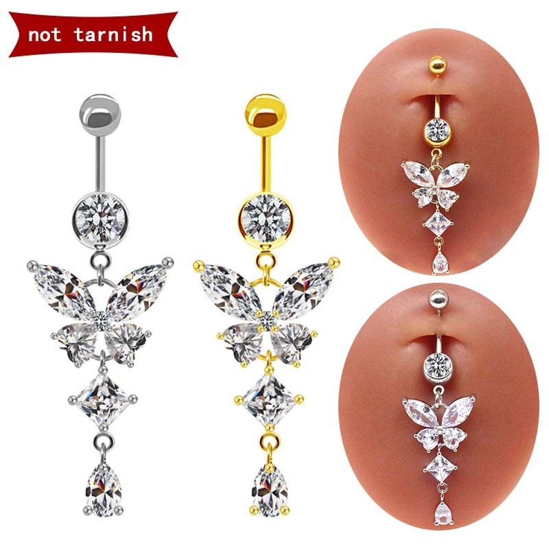 Glittrande fjärilsnavelpiercing