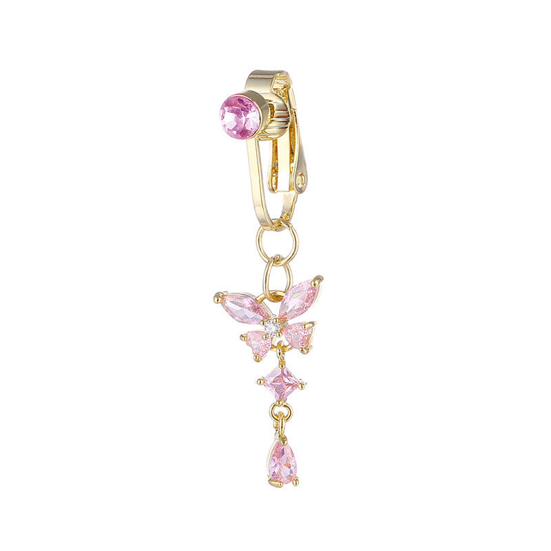 Glittrande fjärilsnavelpiercing