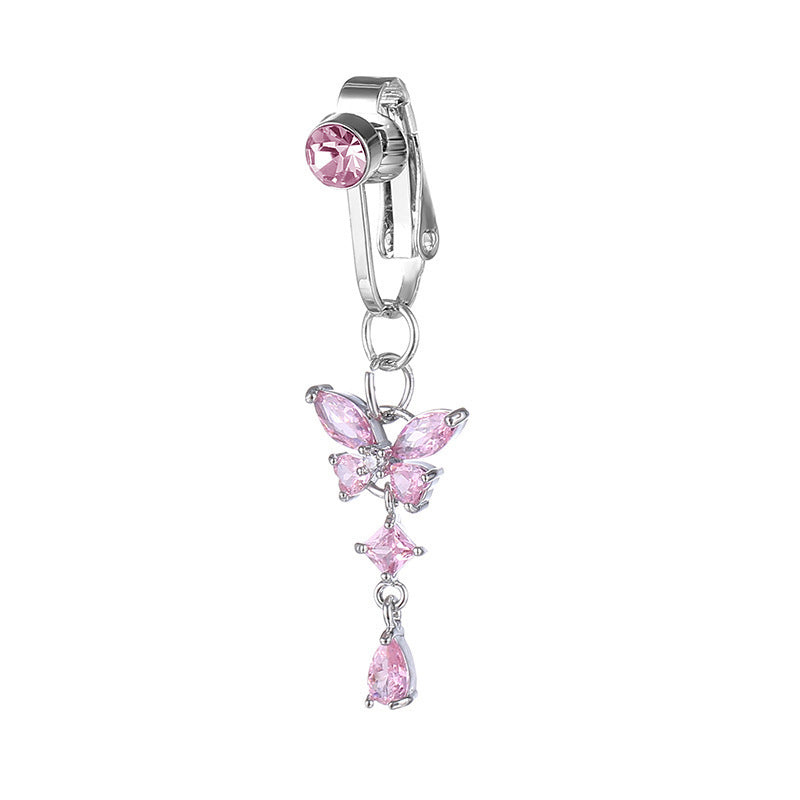 Glittrande fjärilsnavelpiercing